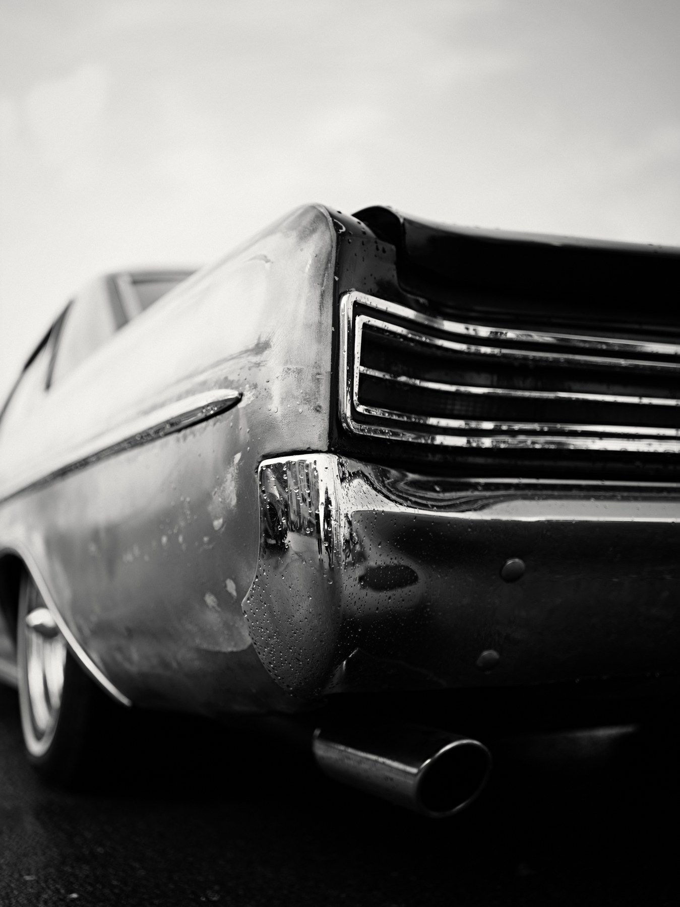 Black-and-white detail of a classic automobile photographed by Tony Shepherd