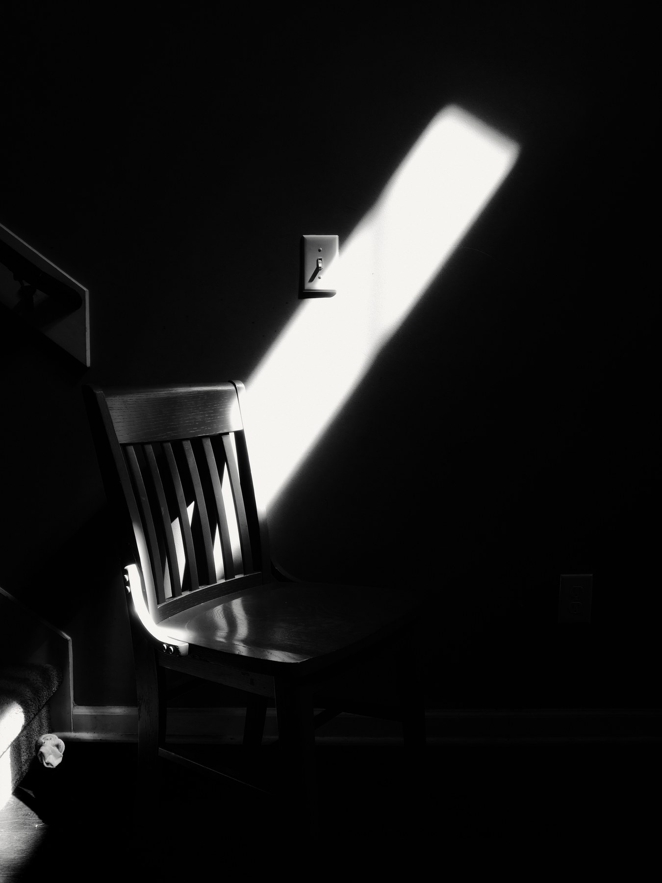 A beam of light photographed in black and white